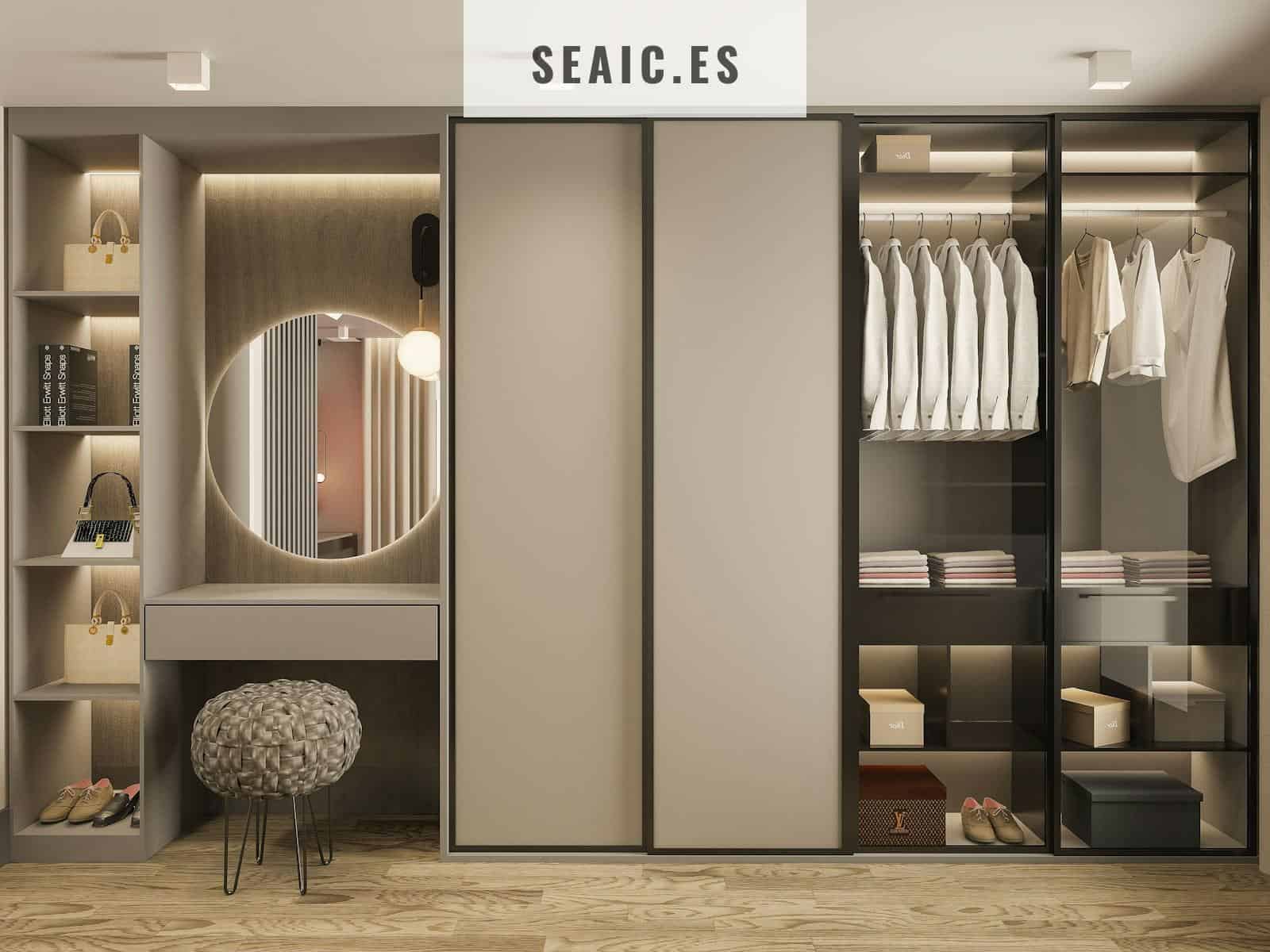 a walk in closet with a mirror and a stool